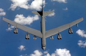 US Navy 030415-F-7194F-015 A B-52 Stratofortress assigned to the 40th Expeditionary Bomb Squadron, loaded with 12 Joint Direct Attack Munitions (JDAM) heads toward Iraq with it's new mission directive.jpg